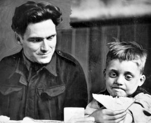 A German soldier at a party given by prisoners for local children in Bridgnorth in April 1947.