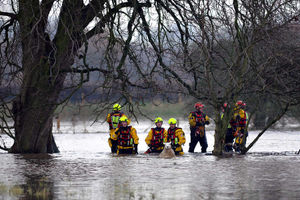Firefighters rescue sheep stranded in flooded fields outside Rugeley in 2012