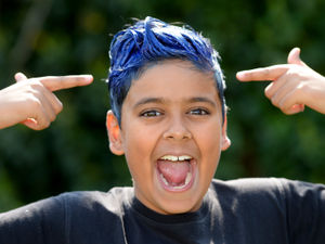 Supporting image for story: Eleven-year-old dyes hair 'NHS blue' to fundraise for food banks