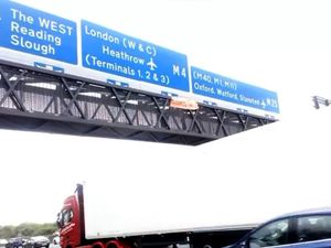 Supporting image for story: Five arrested as demonstrators climb motorway signs in climate protest