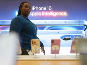 Supporting image for story: Retail sales edge higher as new iPhone launch boosts tech stores