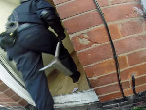 Supporting image for story: Battering cam! Unique view of raid on suspected foreign criminals in the West Midlands
