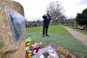 John Workman takes a photo