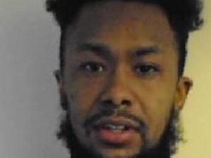 Supporting image for story: Robber on the run from prison may be in West Midlands 