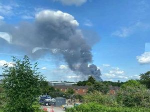 Supporting image for story: 25 firefighters remain at scene of huge factory blaze 