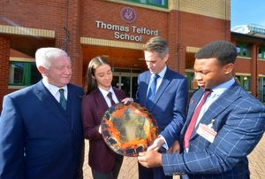 Thomas Telford headmaster Sir Kevin Satchwell, Rosie Brice, 13 and Gareth Effion, 17 present Education Secretary Gavin Williamson with a piece of glass art made by Much Wenlock artist Jane Murphy..