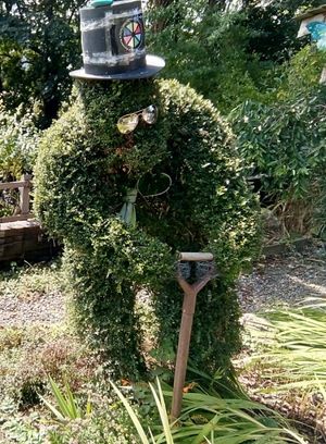 One of the quirky objects in the garden at Ponthafren, on the banks of River Severn run and maintained totally by volunteers