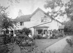 The same property, but strangely the fashions of the seated woman look to be those from long after Henry's death in 1889.