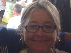 Supporting image for story: Violet honoured for her work for car services 