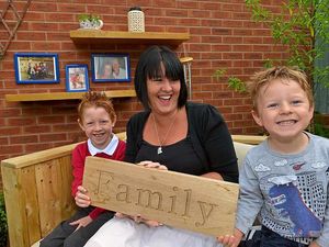 Supporting image for story: IN PICTURES: Walsall family's joy over TV makeover garden tribute to father