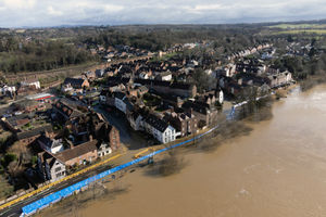 Water has spilled over the flood barriers in Bewdley. Photo: Joe Giddens/PA Wire