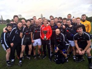 Joel's brother, Owen Richards presents the prize. On his left is Alan Brooks and on the right is captain James McGlynn who was Joel's teacher at Stuart Bathurst School in Wednesbury
