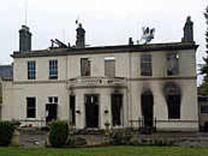 Supporting image for story: Rebuild vow over mansion