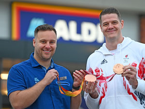 Paralympian Lee Manning with store manager Dave Webster at the Orbital Retail Park in October 2023.