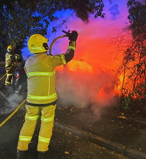 The Vauxhall Corsa was engulfed in flames as firefighters tackled the blaze. Pictures: Market Drayton Fire Station