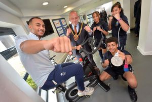Ben Whittaker, the Mayor and students Carlo Swift, 16, Tiarna Grizzle, 14, and Amrin Klare, 11