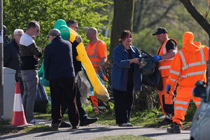 Local residents deliver rubbish to mobile collection vehicles in Erdington, Birmingham. Nearly 400 council bin workers in Birmingham are continuing strike action as part of a row over jobs and pay, with the Unite union saying the city council could end the dispute "by agreeing to pay a decent rate of pay". Picture date: Monday April 7, 2025.