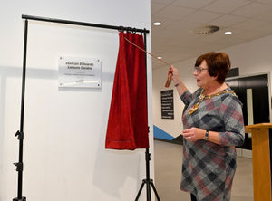 Mayor of Dudley Anne Millward unveils the plaque to officially open the new leisure centre