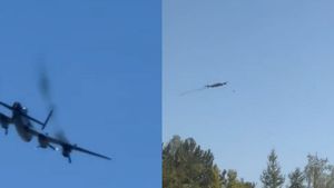 Smoke can be seen coming from a Lancaster Bomber as it flew over Poolsbrook Country Park Caravan and Motorhome Club Campsite in Chesterfield, Derbyshire.