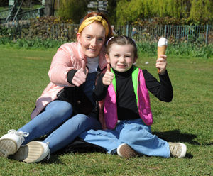 Aileen Buck, and her daughter Niamh Buck, aged 6, enjoy the sunshine and a ice cream at The Quarry, Shrewsbury