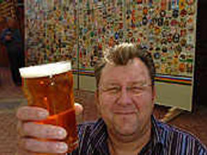 Supporting image for story: Great wall of beer badges