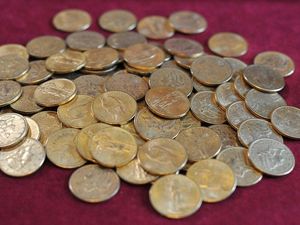 Supporting image for story: Meet the man who carves secret and magical mechanisms into coins