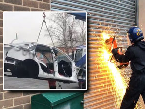 Supporting image for story: WATCH: Police cut their way into Black Country ‘chop shop’ and find shells of stolen cars