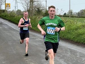 Supporting image for story: Spirits high at return of Newport 10K despite downpour