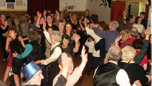 Revellers see in the new millennium at Bomere Heath Village Hall, Shrewsbury