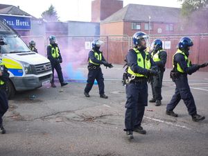 Supporting image for story: Sixteen arrested after protest outside migrant hotel in Epping