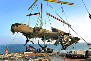 The Dornier Bomber is lifted out of the sea