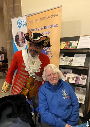 Rugeley Town Crier with Lion Pauline Holmes who manned the ticket sales.