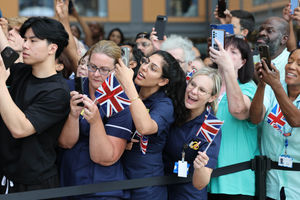 Medical staff cheer as King Charles arrives for his visit to officially open the new Midland Metropolitan University Hospital in Birmingham. Picture date: Wednesday September 3, 2025. PA Photo. Photo credit should read: Richard Pohle/The Times/PA Wire 