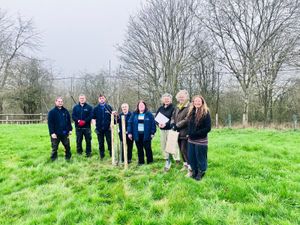 Supporting image for story: Community plants new orchard in south Shropshire