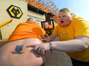 Supporting image for story: Wolves fan Sean needled into Baggies charity tattoo