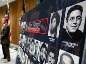 A picture of Daniel Andreas San Diego on a poster of the FBI’s most wanted terrorists during a news conference in 2009