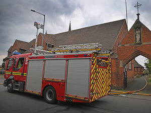 Supporting image for story: Historic church 'smoke logged' after large fire in grounds