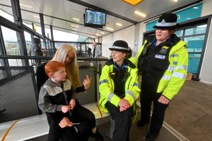 Officers Rebecca Hopkins, Amy Newbrook chat to: Jodie Mitchell and her three-year-old son, Joshua