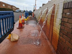 Supporting image for story: Overflowing drain closes Telford footpath - with video
