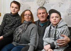 Anne-Marie and Adrian Phillips with their sons Adrian 12, left, and Sam , 10