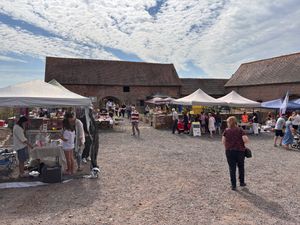 Visitor enjoy a Craft Fair in the courtyard at Frankly Farm Tours in Broseley, Shropshire