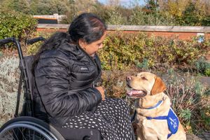 Rajwinder Kaur with support dog Rocky