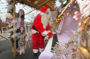 Santa (Kelvin Brittain) with Susie and Jennifer Fox