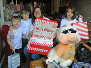 Supporting image for story: Telford family who bounced back from misfortune now packing Christmas goody bags for others