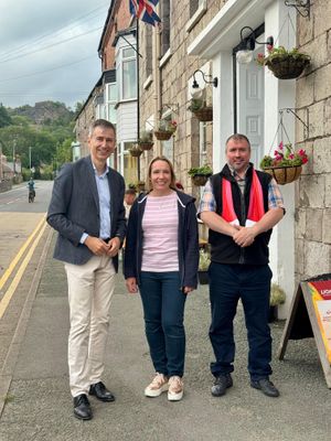 The Swiss ambassador with political - and football - rivals, Lib Dem North Shropshire MP Helen Morgan, and Labour's Montgomeryshire & Glyndwr MP, Steve Witherden.