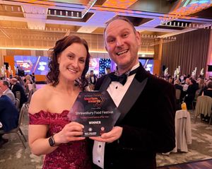 Sid and Beth Heath with Shropshire Festivals' award at West Midlands Tourism Awards.