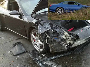 Supporting image for story: IN PICTURES: Porsche 911 smash leaves BMW stuck in hedge