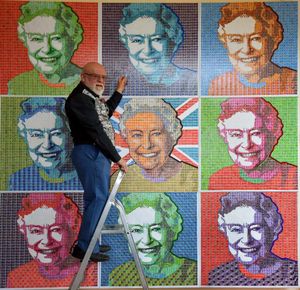 Stamp artist Pete Mason unveils his 90th birthday protrait of Nelson Mandela at Kingsmead High School, Hednesford