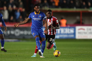 Chey Dunkley of Shrewsbury Town and Cheick Diabate of Exeter City (AMA)