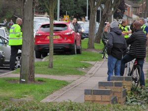 Around ten police cars were on Stowheath Lane. Photo: David Evans